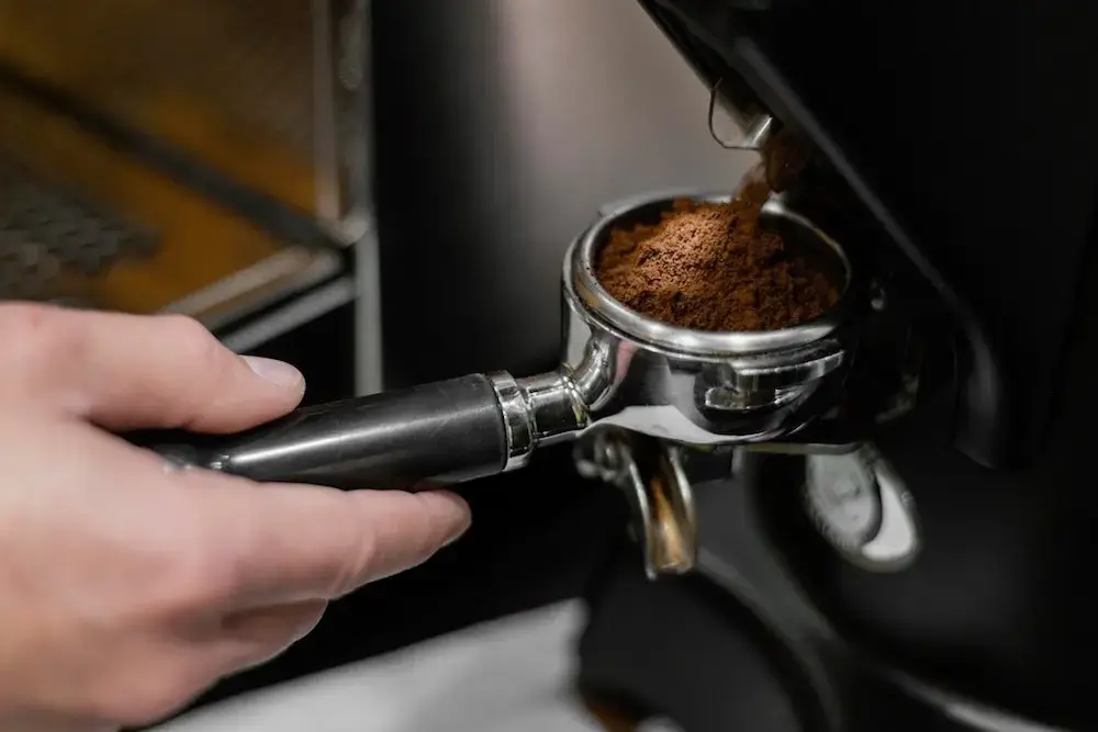 Barista Grinding Coffee Barista Grinding Coffee