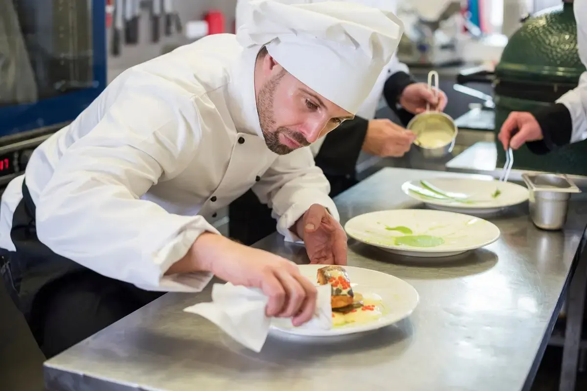 Chef Preparing Food on Plate