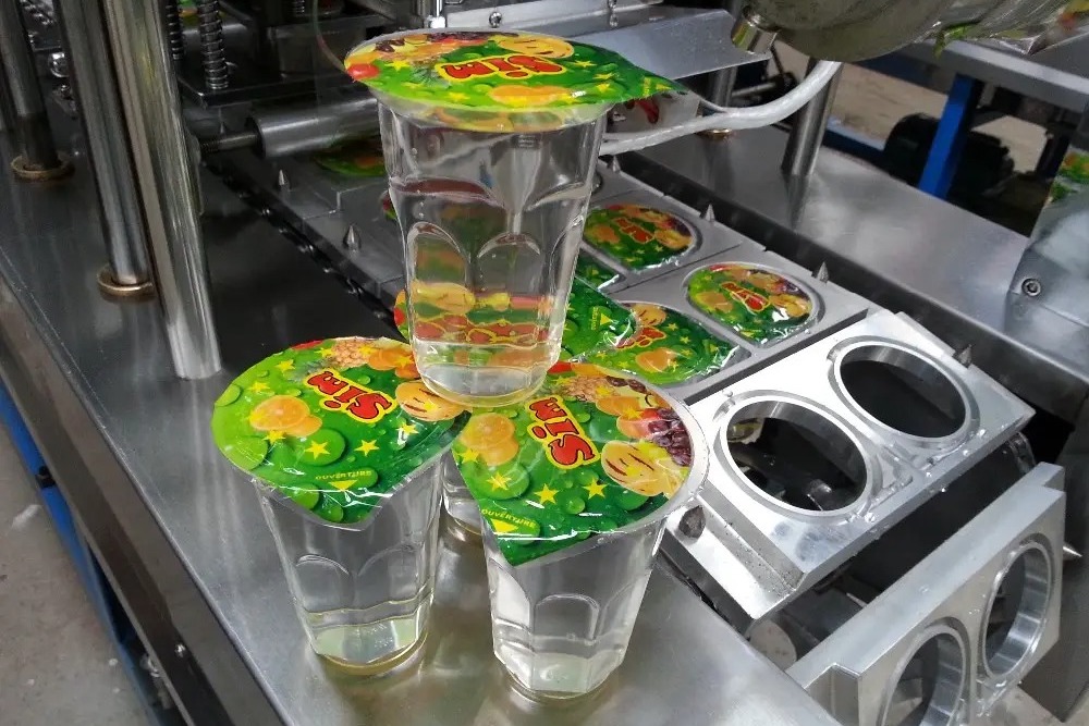 Automatic Cup Sealing Mesin Effect